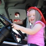 Fire Prevention Week Alivia in Fire Truck