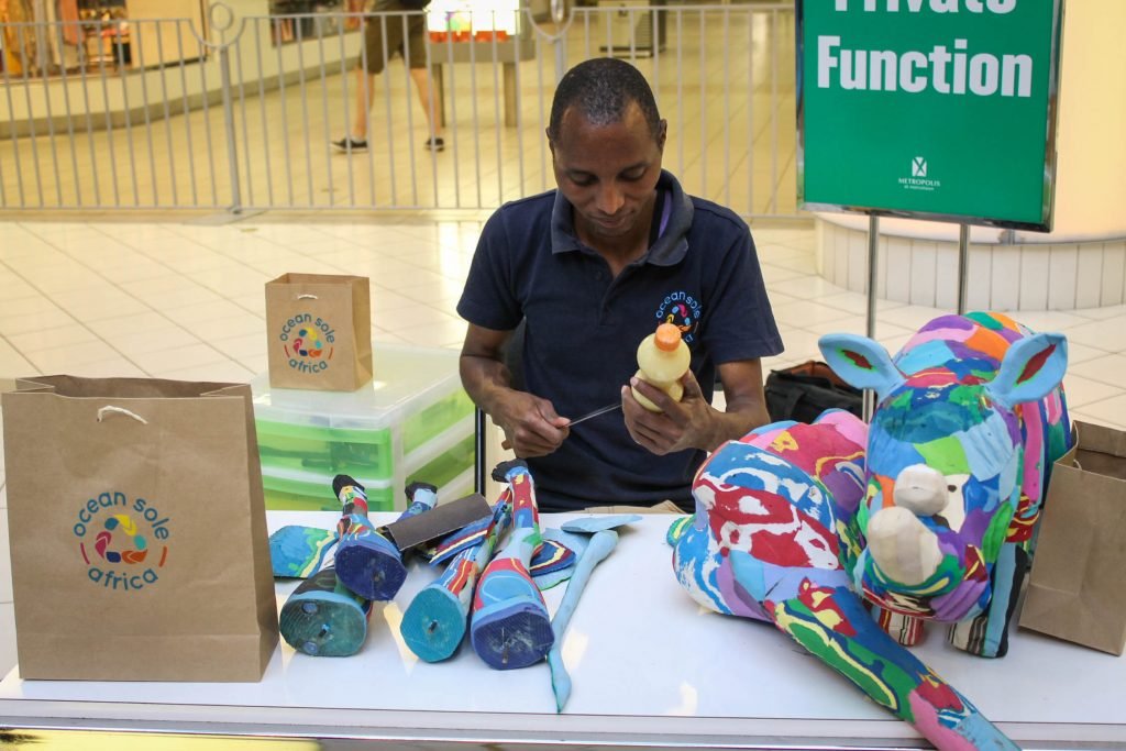 Ocean Sole Africa artist Jonathan making baby rhino