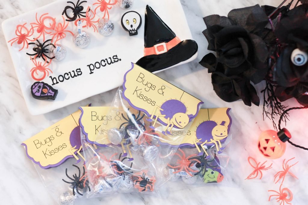 Halloween flatlay with Bugs & Kisses bags made with Cricut