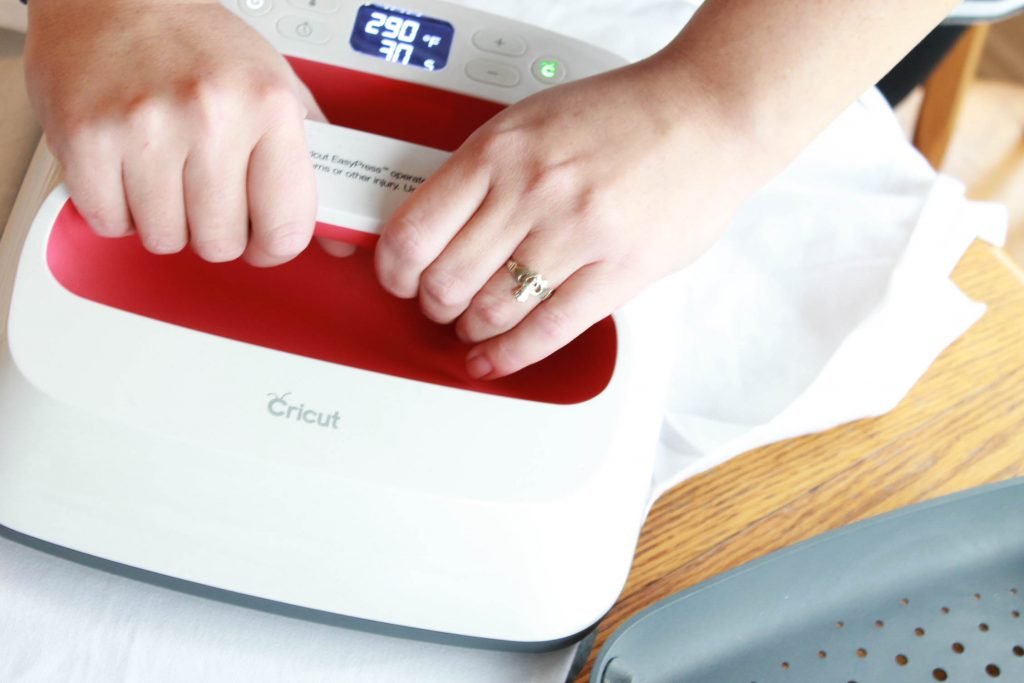 Cricut EasyPress Being Pressed down by hands