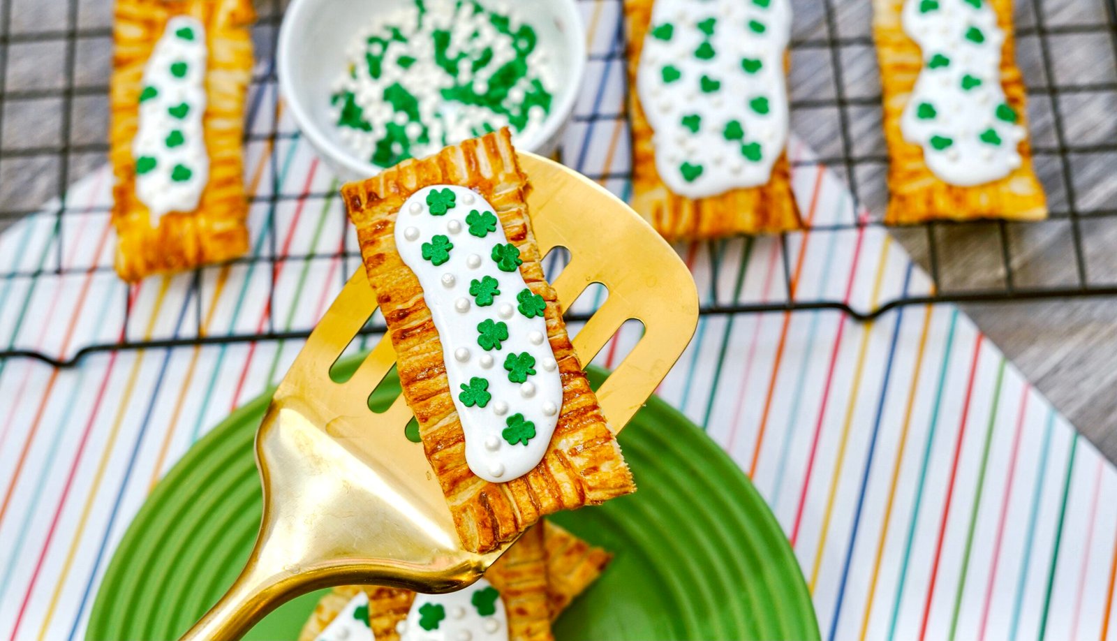 Crispy poptart being held on top of a golden spatula