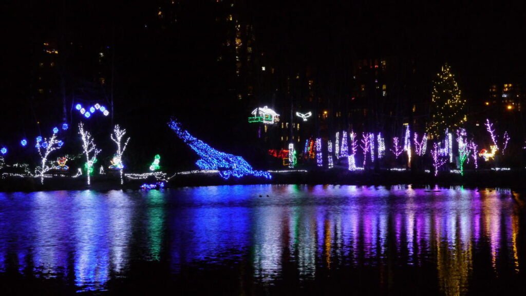 Vancouver Christmas Traditions - Lights reflecting off of LaFarge Lake in Coquitlam