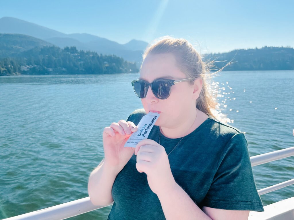 Tara British Columbia Mom standing against mountain backdrop using Mikra CELLF cellular performance packages