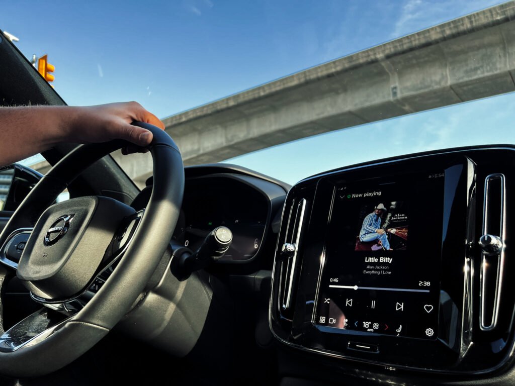 Volvo XC40 Recharge view of steering wheel with skytrain bridge above