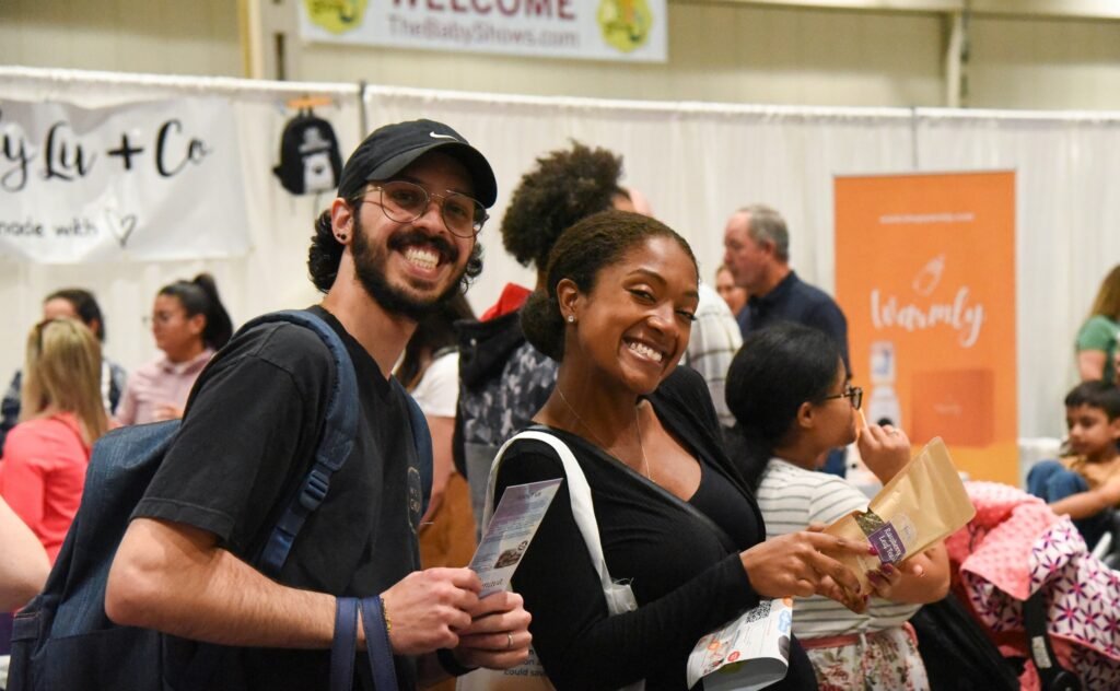 The Baby Show guests holding samples and products