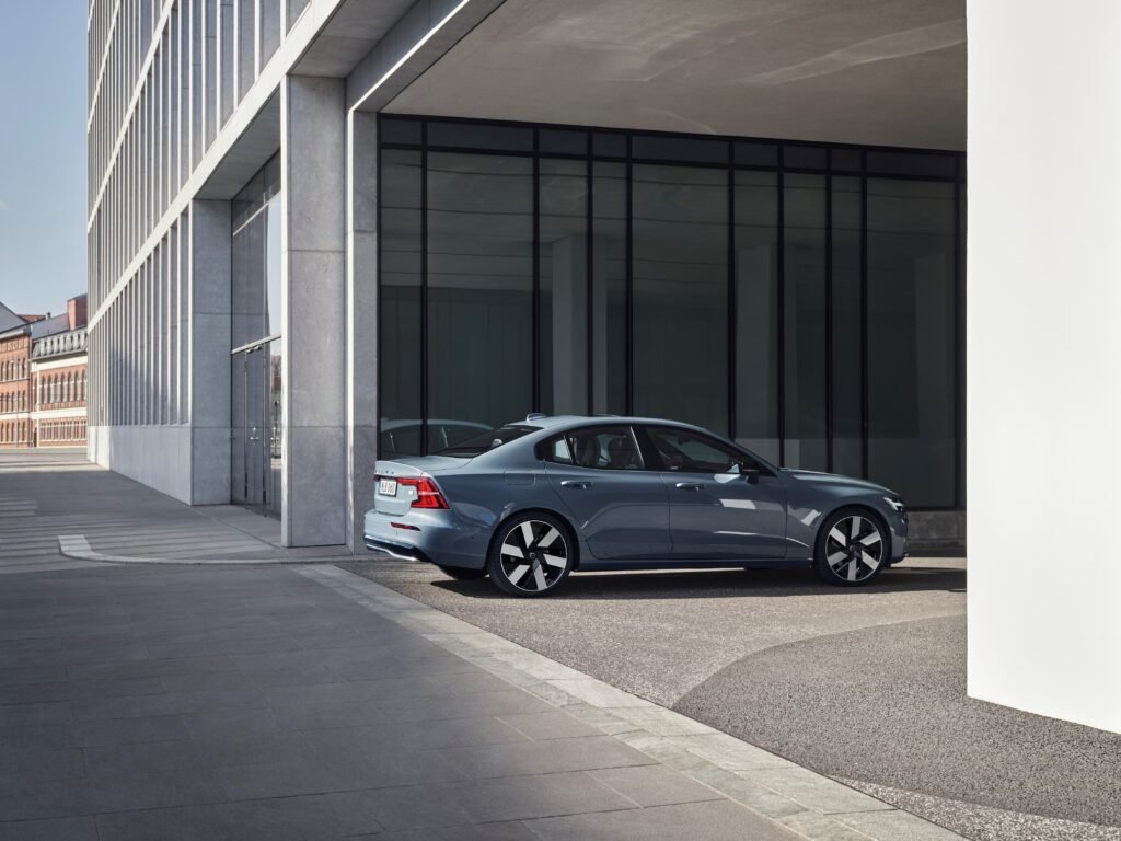 Volvo S60 Recharge T8, Thunder Grey Sedan entering an underground parking lot